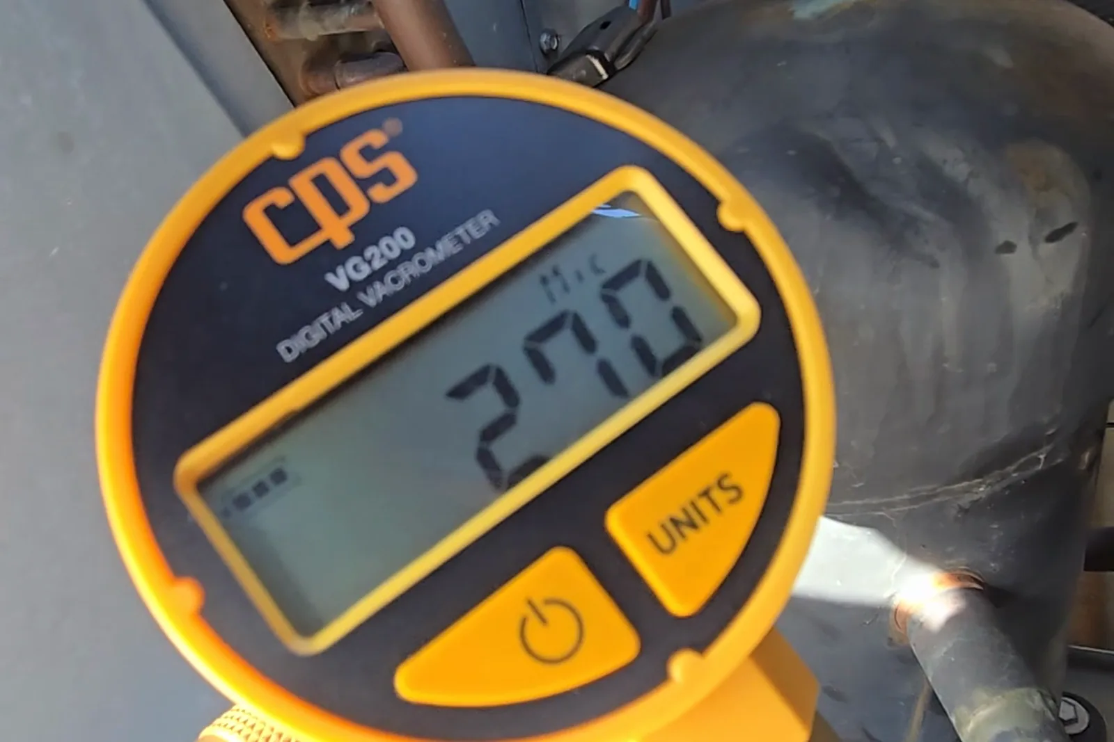 Vacuum gauge holding at 270 microns on the repaired Lennox package unit
