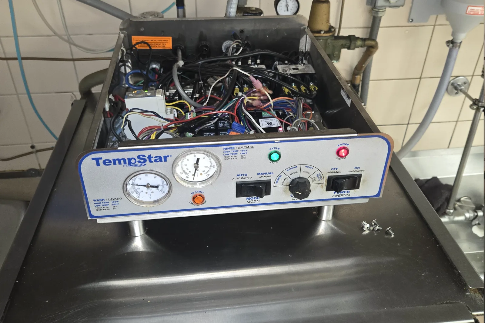 TempStar dishwasher control panel back on the machine after the board replacement