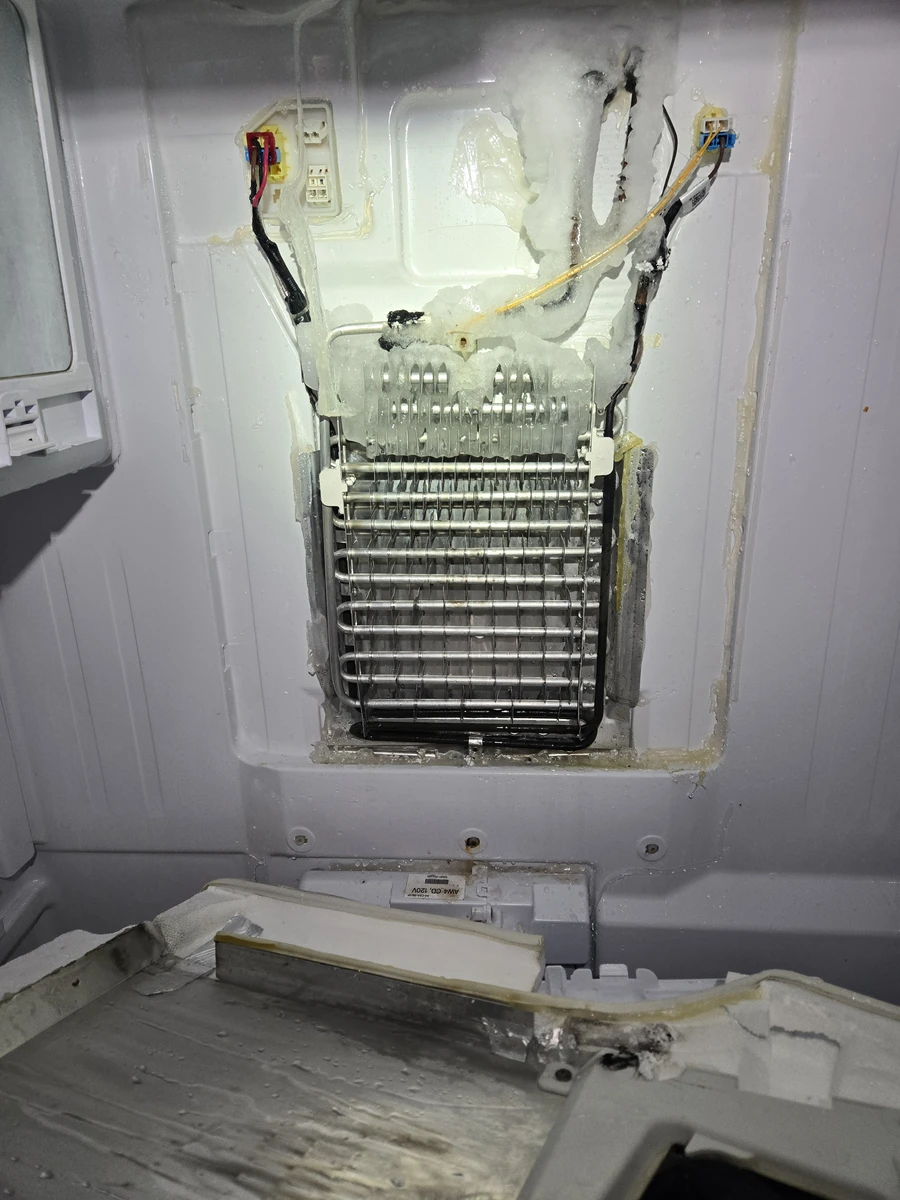 Ice around the upper evaporator in this Samsung refrigerator.