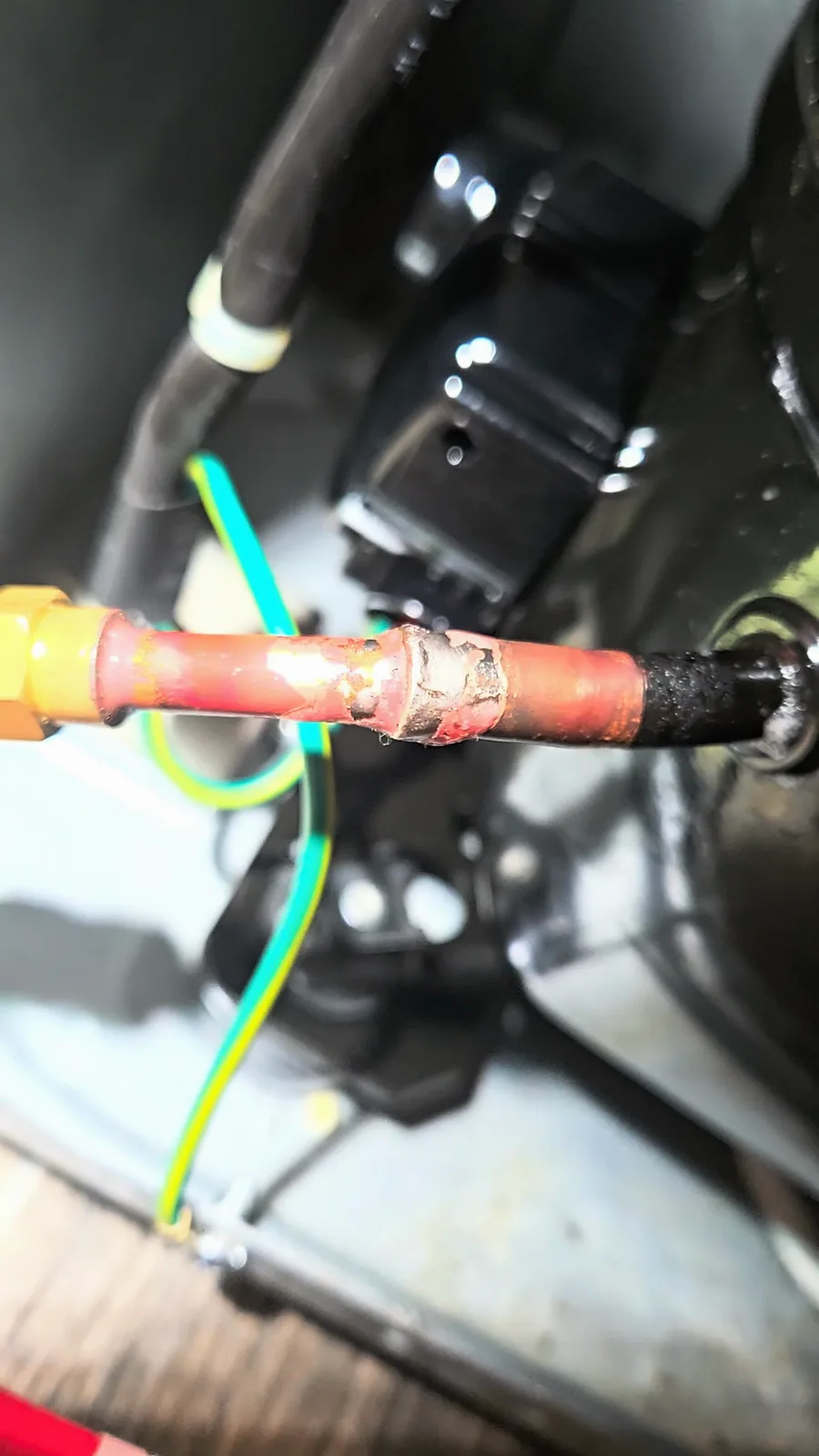 The joint at the compressor access valve after it was re-brazed