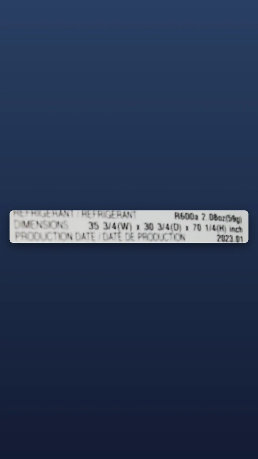 Close crop of the LG refrigerator rating label showing the production date 2023.01