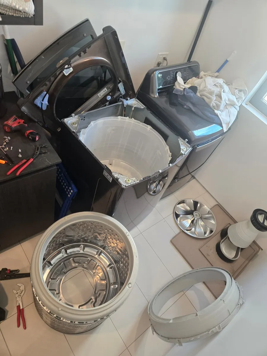 Lavadora LG de carga superior completamente desarmada para reparar el tambor y los sellos por Epic Star en Culver City, CA