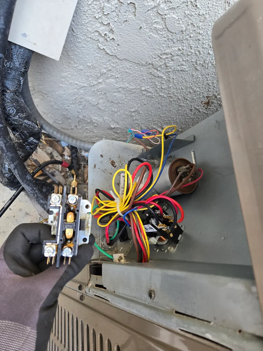 York condenser contactor shown during replacement